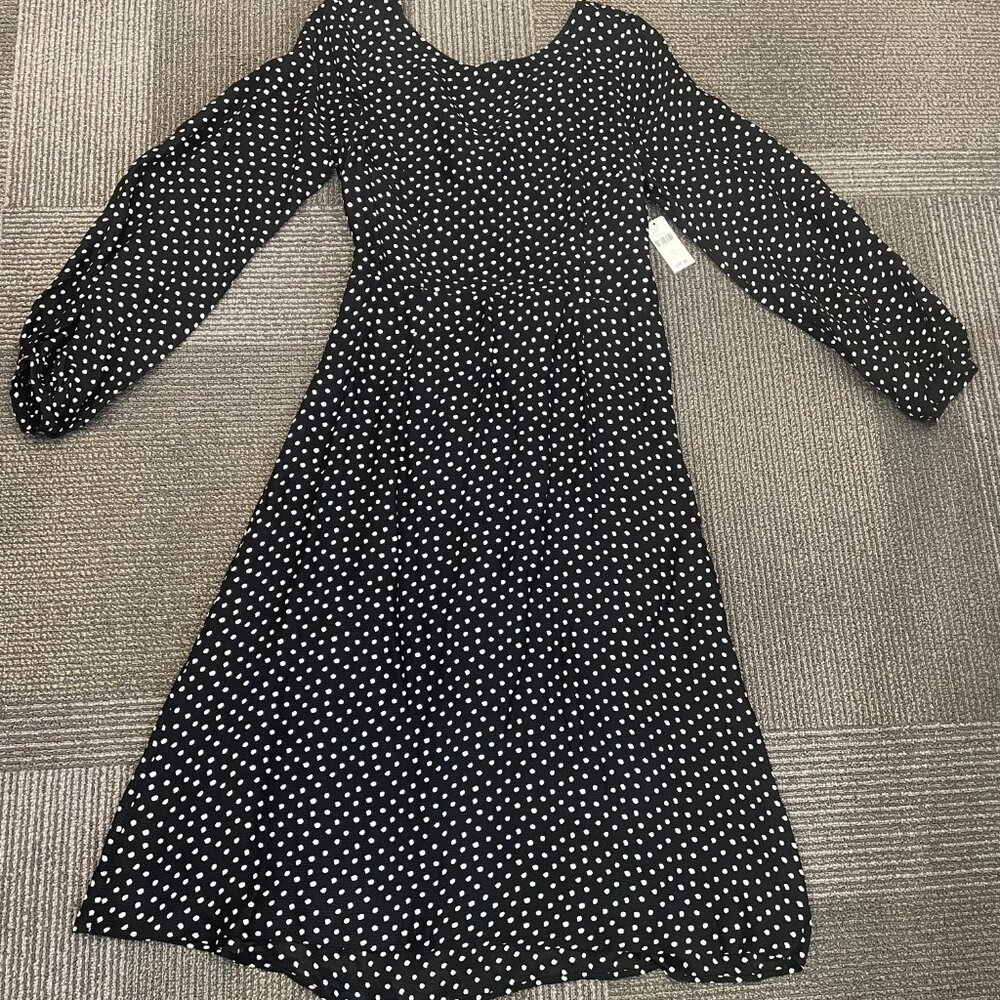 Anthropologie midi dress. size US 4, black with white polka dots.